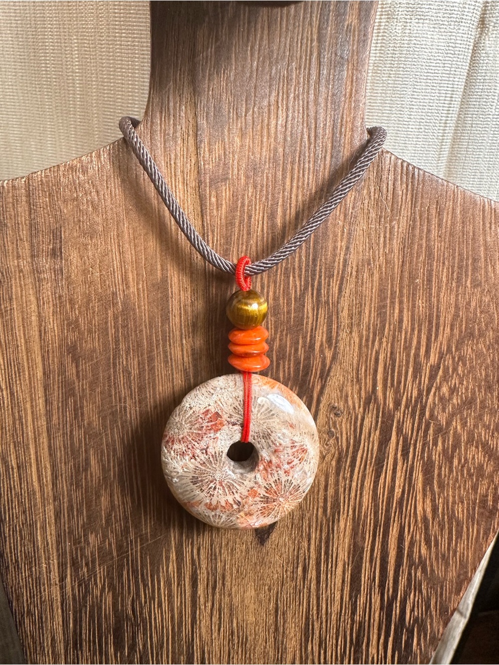 Handcrafted Red and Brown Coral Fossil Donut Pendant Necklace on Brown Rope - Picture 12 of 16